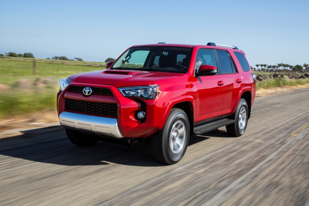 2014 red toyota 4runner driving