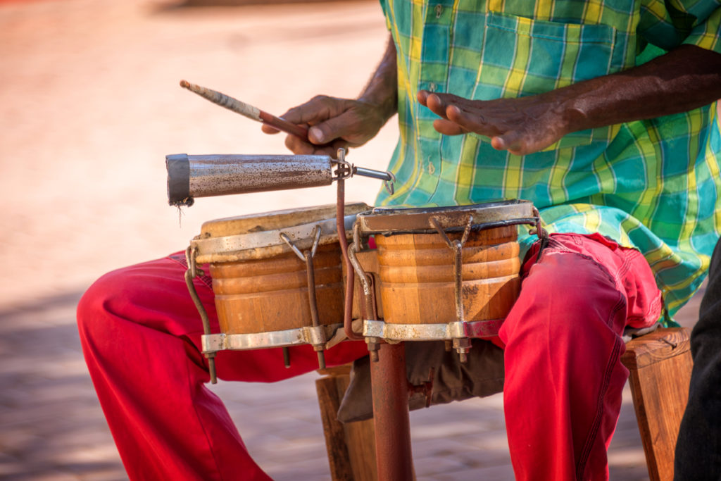 Street musician playing drums for CACAO Caribbean festival